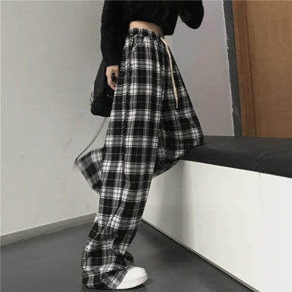 Pantalones holgados unisex de cintura elástica a cuadros negros de gran tamaño
