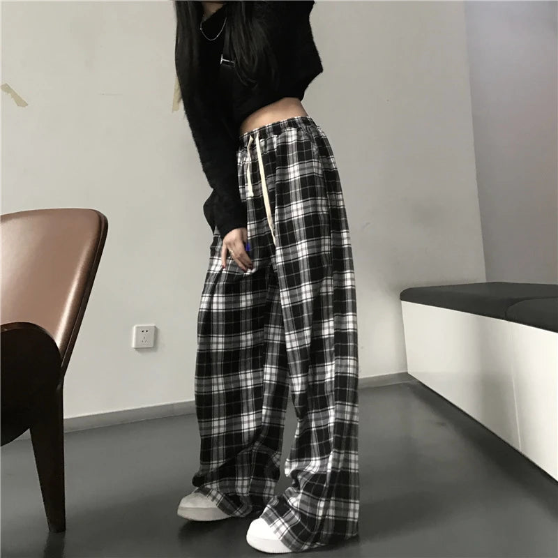 Pantalones holgados unisex de cintura elástica a cuadros negros de gran tamaño
