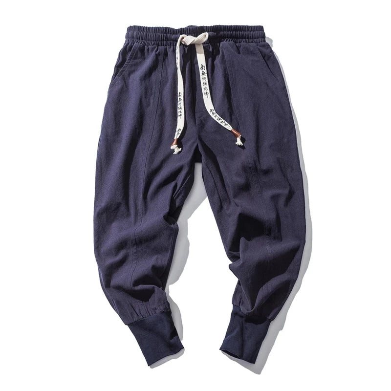 Cós elástico liso, estilo jogger, caimento solto, virilha baixa
