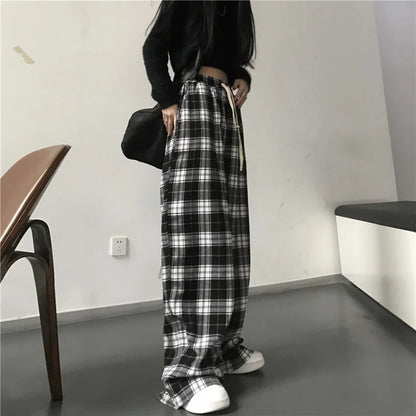 Pantalones holgados unisex de cintura elástica a cuadros negros de gran tamaño